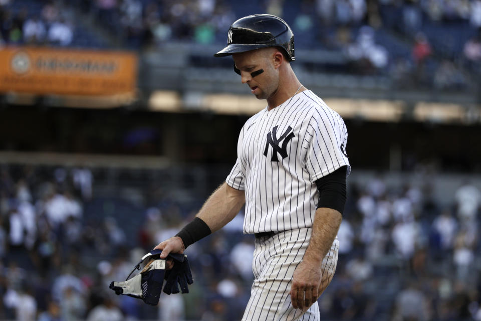 New York Yankees' Brett Gardner walks off the field after being defeated by the Tampa Bay Rays in a baseball game on Saturday, Oct. 2, 2021, in New York. The Rays won 12-2. (AP Photo/Adam Hunger)