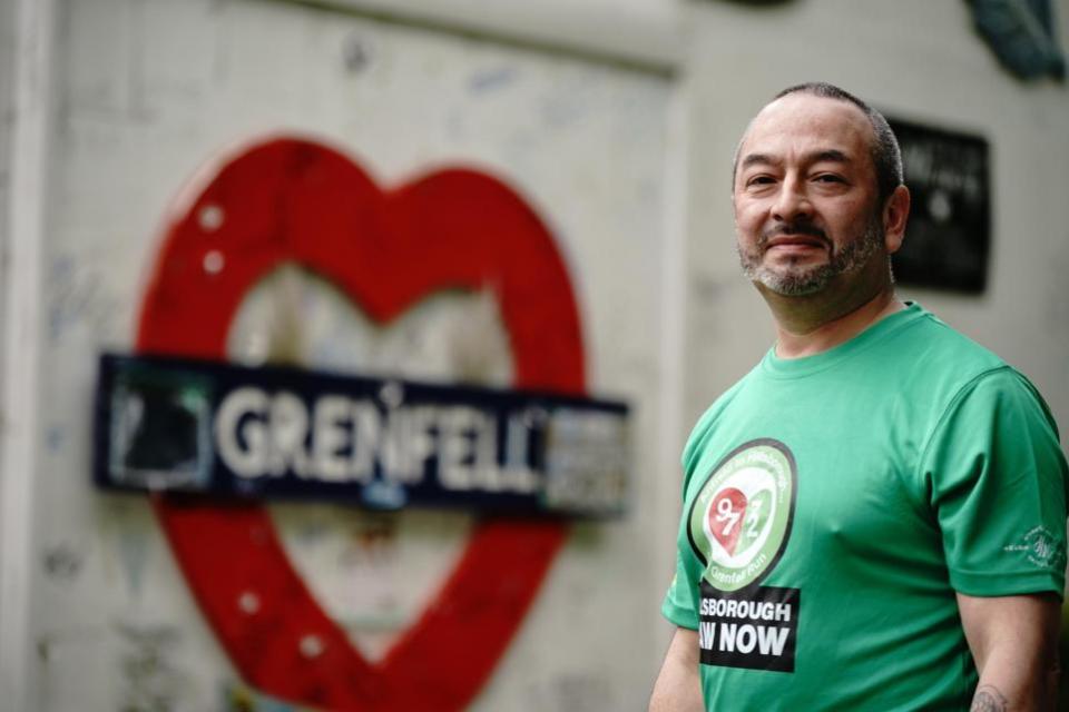 The Northern Echo: Manny Ruiz who joined Mik Parkin during his charity run for the Hillsborough Law campaign, from Liverpool to London at Grenfell Tower