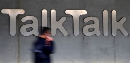 A man walks past a company logo outside a TalkTalk building in London, in this file photograph dated October 23, 2015. British broadband operator TalkTalk on November 11, 2015 put the cost of last month's cyber attack at 30 million to 35 million pounds, and said it was too soon to gauge the impact on customer numbers, although it did see an immediate spike in defections. REUTERS/Stefan Wermuth/files - RTS6F3L