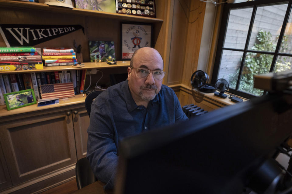 Craigslist founder Craig Newmark sits in his home office in New York, on Thursday, Feb. 9, 2023. Newmark earned a spot on the Chronicle of Philanthropy's "Philanthropy 50" list this year for his donations to charitable causes focusing on cybersecurity and journalism. (AP Photo/Robert Bumsted)