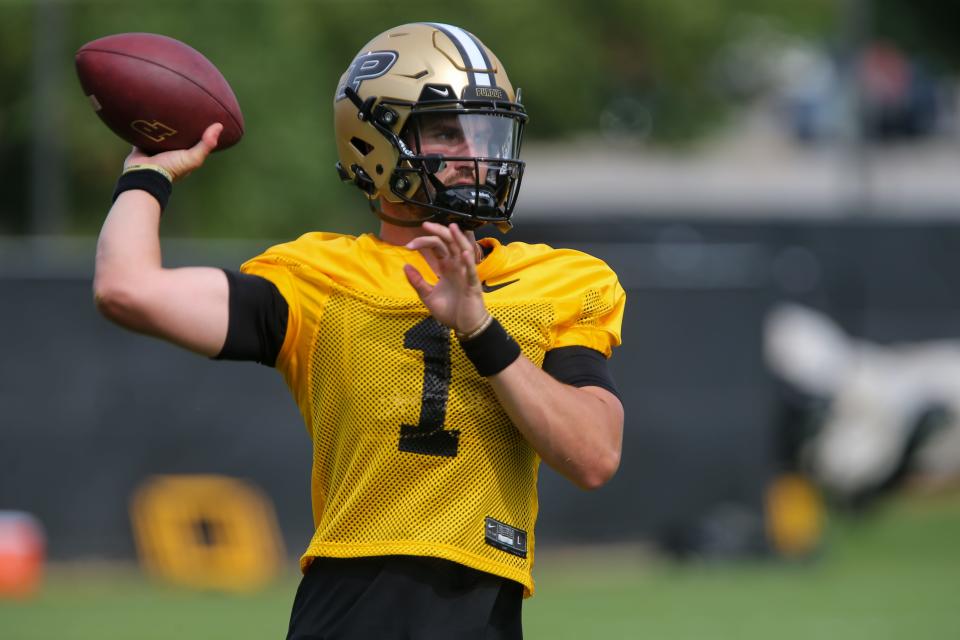 Purdue Boilermaker quarterback Hudson Card (1) runs a drill during Purdue football practice, Wednesday, August 2, 2023, at Purdue University in West Lafayette, Ind.