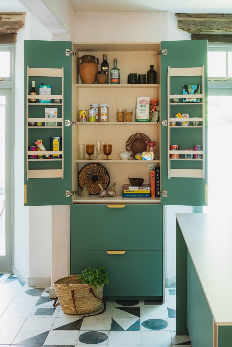 <p>The humble pantry gets an upgrade. This design from Husk Kitchens, boasting vibrant green cupboards and gold handles, is ideal for anyone wanting to make a statement with storage. </p><p>• See more from <a href="https://madebyhusk.com/" rel="nofollow noopener" target="_blank" data-ylk="slk:Husk Kitchens;elm:context_link;itc:0;sec:content-canvas" class="link ">Husk Kitchens</a></p>