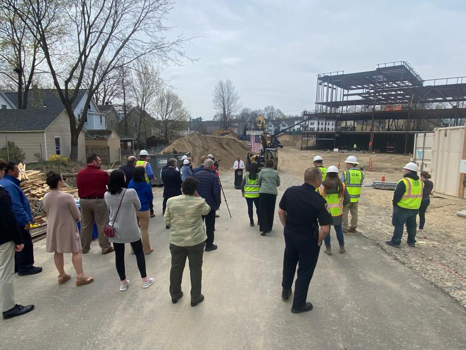 A small crowd gathered at the site of the new Leominster police station on Central Street April 25 for a “topping off” ceremony.