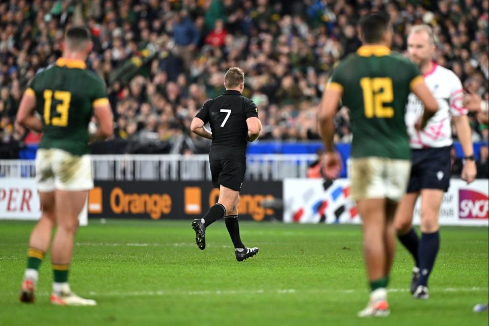 Sam Cane runs off to the sin-bin after his dangerous tackle (Getty Images)