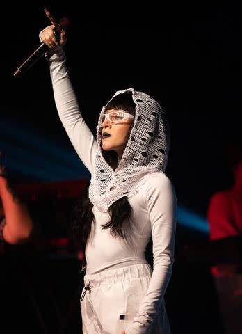 <p>Scott Dudelson/Getty</p> Nicki Nicole performs onstage in the Sonora Tent at the Coachella Valley Music and Arts Festival in April 2022 in Indio, California