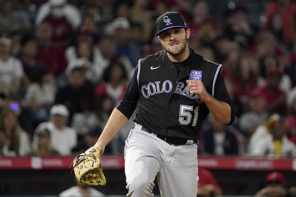 Colorado Rockies relief pitcher Ben Bowden celebrates after striking out Los Angeles Angels' Justin Upton to end the seventh inning of a baseball game Monday, July 26, 2021, in Anaheim, Calif. (AP Photo/Mark J. Terrill)