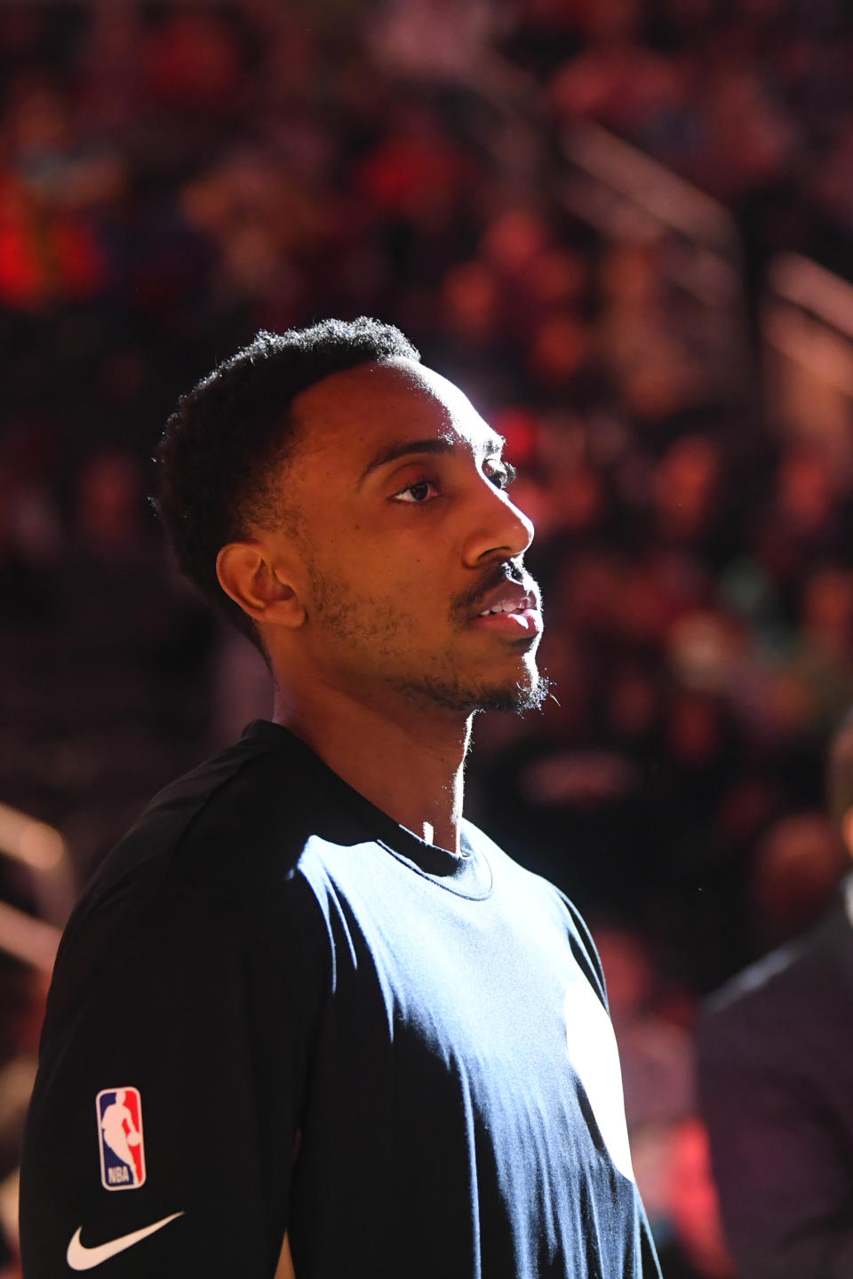 Atlanta Hawks guard Jeff Teague looks on as teammates are introduced before an NBA basketball game against the Detroit Pistons, Saturday, Jan. 18, 2020, in Atlanta. (AP Photo/John Amis)