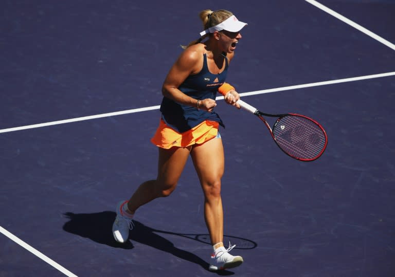 Angelique Kerber of Germany celebrates winning the first set against Pauline Parmentier of France, in Indian Wells, California, on March 13, 2017