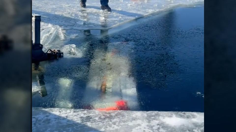 Sunken Ford Super Duty Dives 22 Feet Into Frozen Lake With Trailer Attached photo