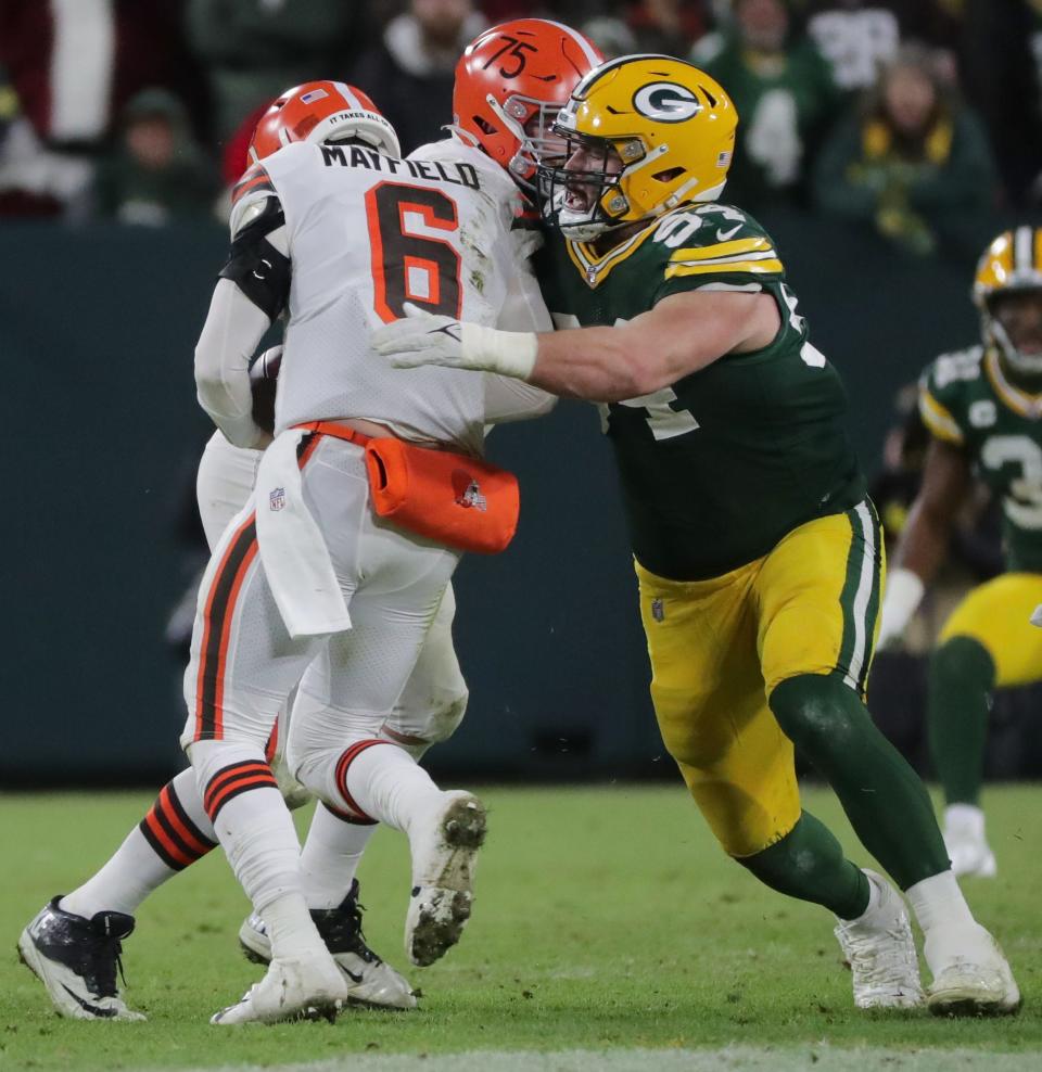 Green Bay Packers defensive end Dean Lowry (94) sacks Cleveland Browns quarterback Baker Mayfield (6) during the fourth quarter of their game Saturday, December 25, 2021 at Lambeau Field in Green Bay, Wis.