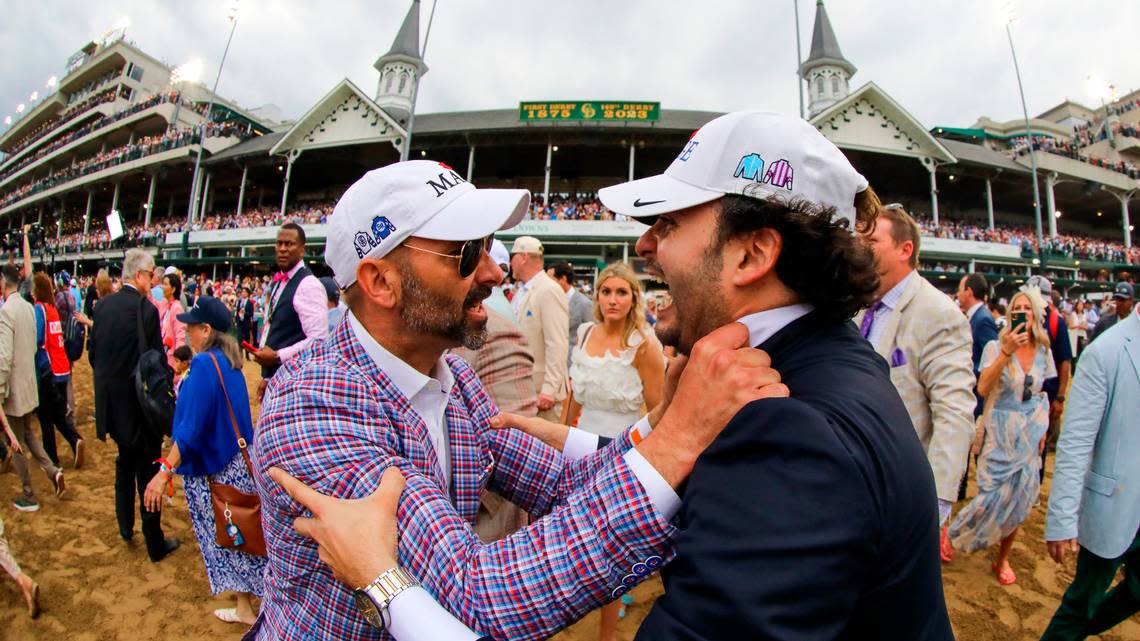 Part-owner and assistant trainer Gustavo Delgado Jr., right, celebrates after Mage wins the 149th running of the Kentucky Derby at Churchill Downs in Louisville, Ky., on Saturday, May 6, 2023. Brian Simms/bsimms@herald-leader.com