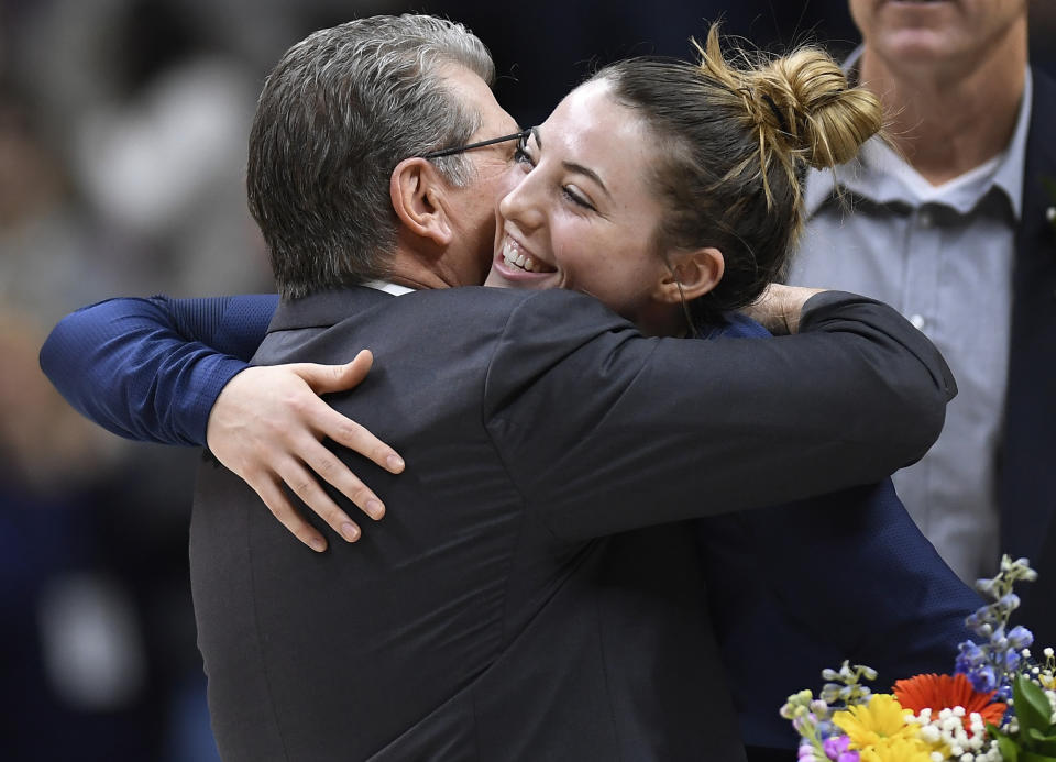 Connecticut head coach Geno Auriemma embraces Connecticut's Katie Lou Samuelson during senior night ceremonies before an NCAA college basketball game against Houston, Saturday, March 2, 2019, in Storrs, Conn. (AP Photo/Jessica Hill)