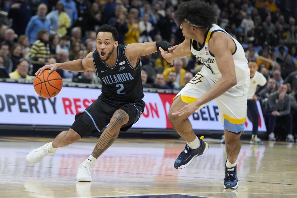 Villanova's Mark Armstrong tries to get past Marquette's Stevie Mitchell during the second half of an NCAA college basketball game Monday, Jan. 15, 2024, in Milwaukee. Marquette won 87-74. (AP Photo/Morry Gash)