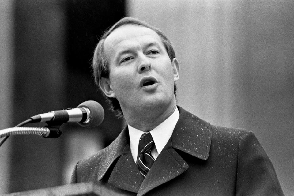 Gov. Lamar Alexander delivers his inaugural speech to a crowd that overflows the Legislative Plaza despite dreary weather Jan. 20, 1979. After the speech Alexander donned his familiar plaid shirt to walk in the inaugural parade.