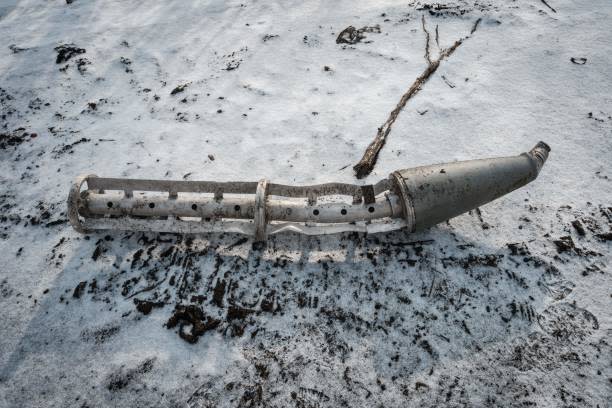 A casing of a cluster bomb rocket lays on the snow-covered ground in Zarichne on 6 February 2023, amid the Russian invasion of Ukraine (AFP via Getty Images)