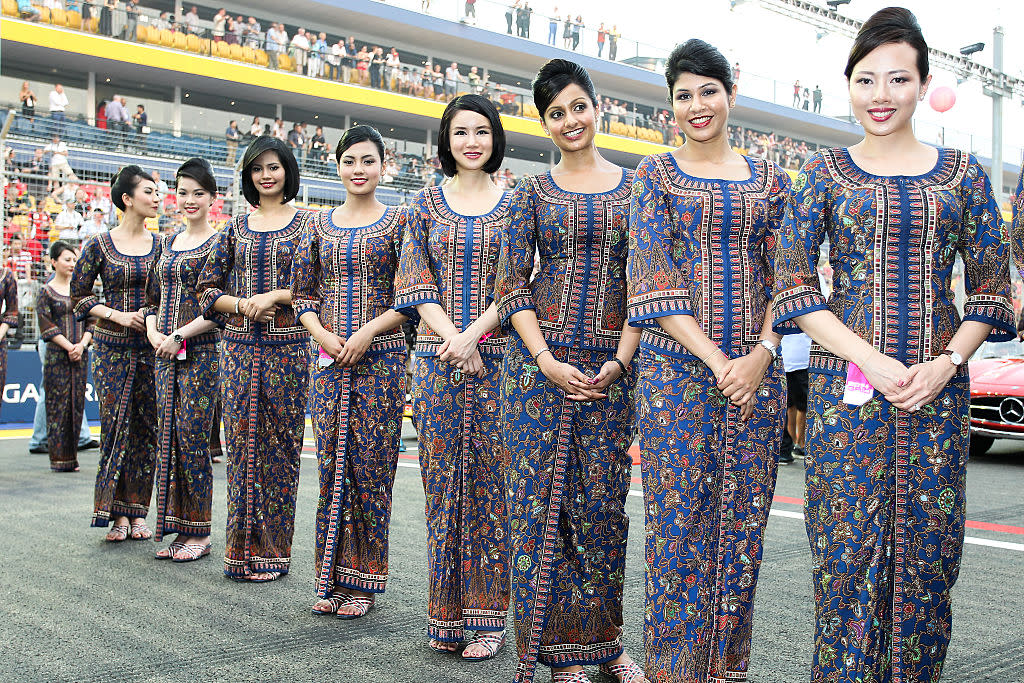 Grid girls before the start of the race of the Formula One Singapore Airlines Singapore Grand Prix on 21 September 2014. (PHOTO: Getty Images)