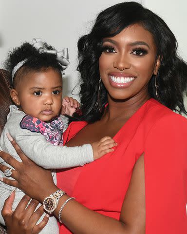 <p>Paras Griffin/Getty</p> Porsha Williams with her daughter Pilar Jhena during A3C Festival & Conference at AmericasMart on October 10, 2019 in Atlanta, Georgia.
