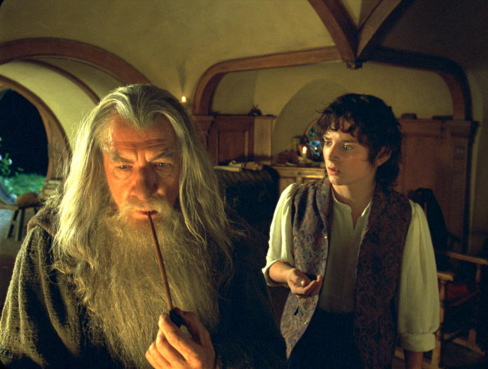 Ian McKellen (L) as Gandalf with Elijah Wood as Frodo. (Photo by New Line/WireImage)