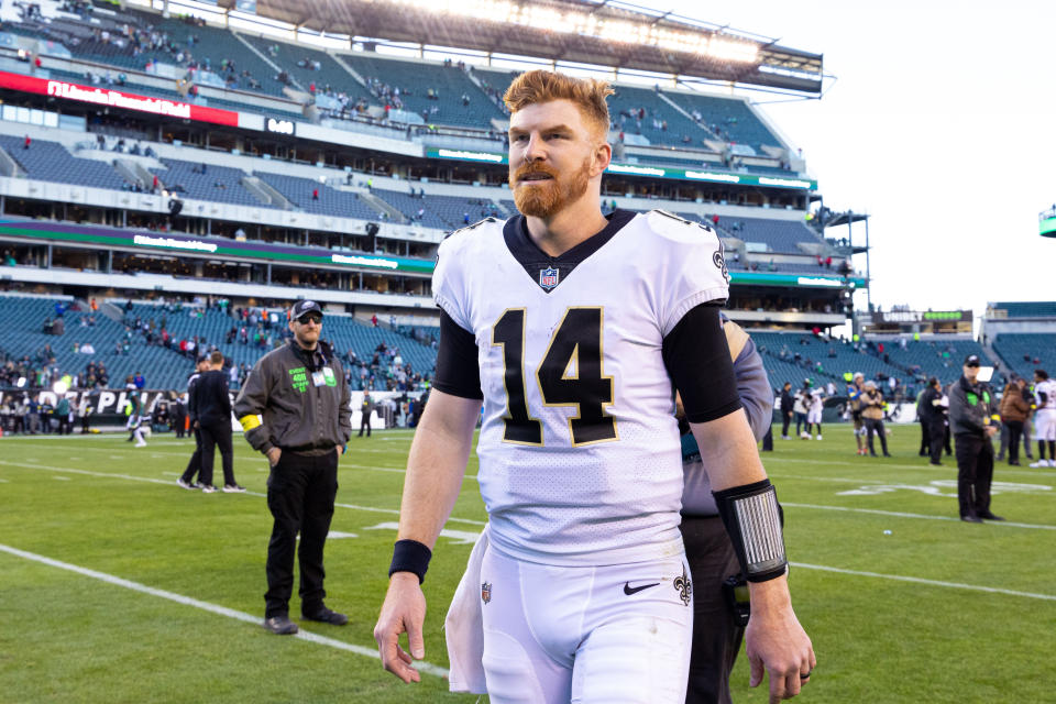 Jan 1, 2023; Philadelphia, Pennsylvania, USA; New Orleans Saints quarterback Andy Dalton (14) walks off the field after a victory against the Philadelphia Eagles at Lincoln Financial Field. Mandatory Credit: Bill Streicher-USA TODAY Sports