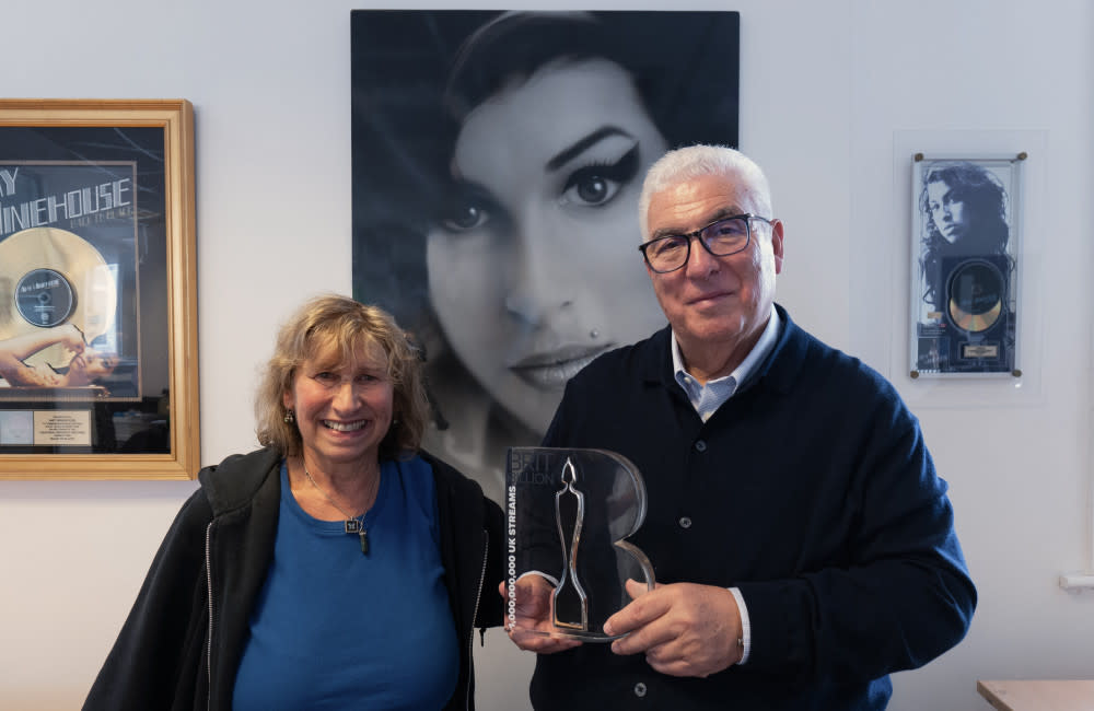 Janis and Mitch Winehouse collected the prize on behalf of their late daughter credit:Bang Showbiz