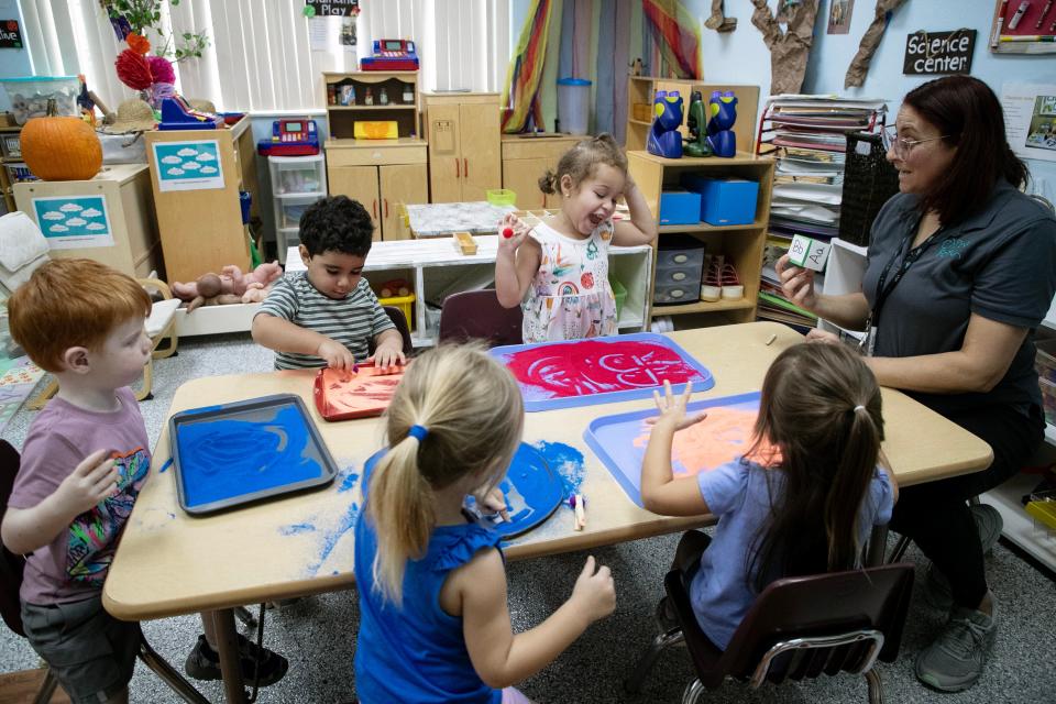 Gladimar de Jesus works with children in her 2-3 year-old classroom on Monday, Oct. 9, 2023, at Child’s Path in Naples. Child care centers have to find new avenues of support to replace subsidies from the federal government under the American Rescue Plan that ended Sept. 30.