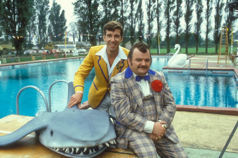 HI-DE-HI TV COMEDY SERIES, STARRING PAUL SHANE AS TED BOVIS (R) AND JEFFREY HOLLAND AS SPIKE DIXON.