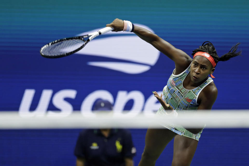 Coco Gauff serves to Naomi Osaka, of Japan, during the third round of the U.S. Open tennis tournament Saturday, Aug. 31, 2019, in New York. (AP Photo/Adam Hunger)