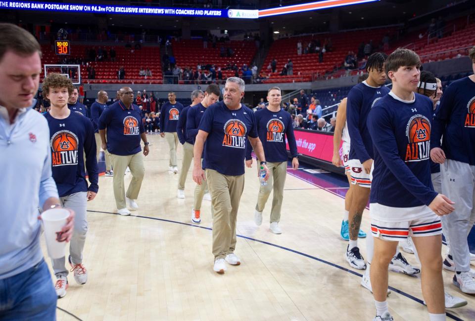 Auburn Tigers head coach Bruce Pearl walks off the court with his team after the game as Auburn Tigers take on Kentucky Wildcats at Neville Arena in Auburn, Ala., on Saturday, Feb. 17, 2024. Kentucky Wildcats defeated Auburn Tigers 70-59.