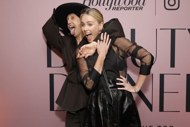 <p>Emma McIntyre/The Hollywood Reporter via Getty Images</p> Charlize Theron and hairstylist Adir Abergel at The Hollywood Reporter Beauty Dinner on October 25, 2023 in West Hollywood, California
