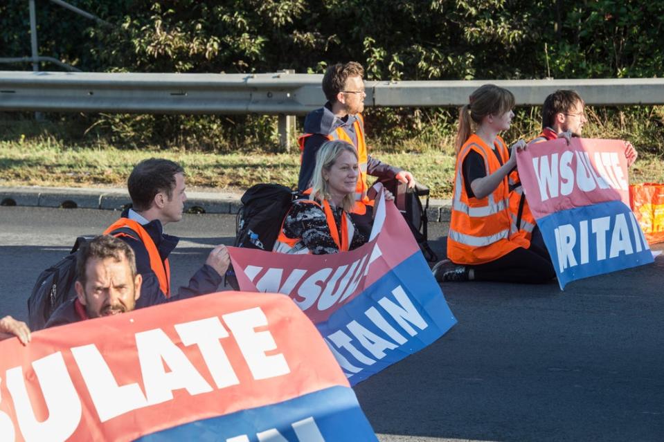 Insulate Britain protestors are demanding the government funds insulation retrofitting in buildings by 2030  (Getty)