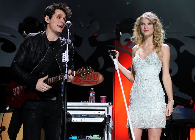 <p>Theo Wargo/WireImage</p> John Mayer and Taylor Swift perform together in December 2009