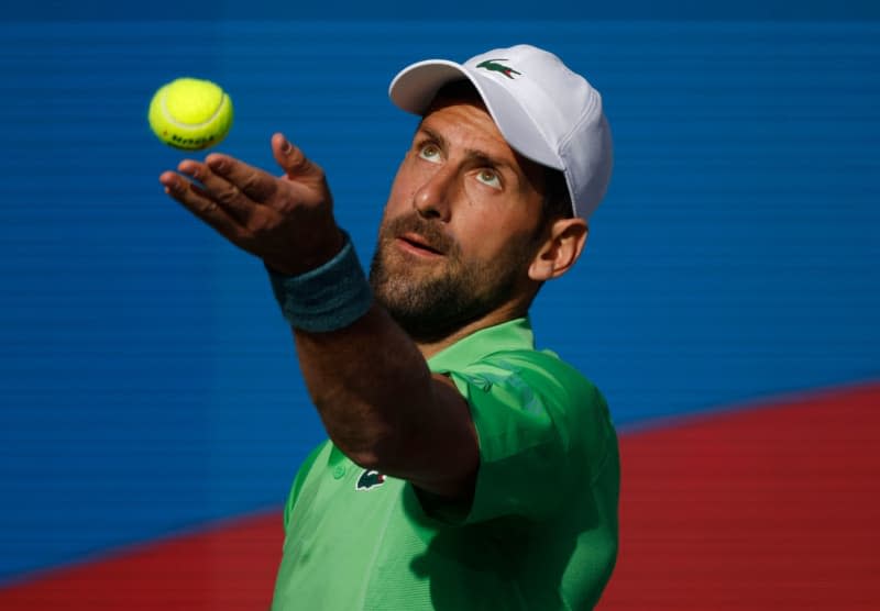 Serbian tennis player Novak Djokovic in action against Australia's Aleksandar Vukic during  their men's singles second round match of the BNP Paribas Open at Indian Wells Tennis Garden. Charles Baus/CSM via ZUMA Press Wire/dpa