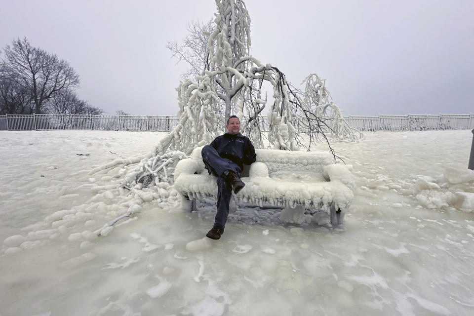 Mist from the Great Falls has created a frozen wonderland around the waterfalls in Paterson, N.J., on Thursday, Jan. 18, 2024. People are braving the subfreezing cold temps and slippery walkways to visit the ice-covered trees, benches and lamposts. (AP Photo/Ted Shaffrey)