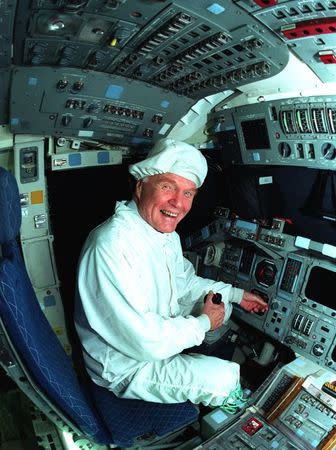 Ohio Senator John Glenn tours the flight deck of the shuttle Columbia at Kennedy Space Center in this NASA handout photo dated January 21, 1998. Glenn will be a mission specialist aboard the Space Shuttle Discovery STS-95 mission. Courtesy NASA/Handout via REUTERS