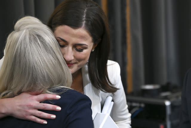 <p>Brandon Bell/Getty</p> Cassidy Hutchinson hugs Rep. Liz Cheney, vice chair of the Jan. 6 House committee, after her two-hour live testimony on June 28, 2022