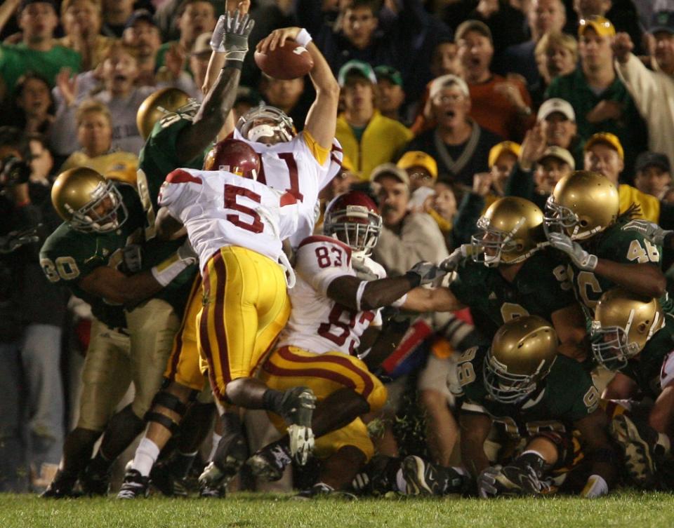 Oct. 15, 2005; South Bend, IN, USA; Southern California Trojans quarterback Matt Leinart runs the ball into the endzone for the game-winning score against the Notre Dame Fighting Irish Saturday Oct. 15 at Notre Dame Stadium. USC won 34-31. Mandatory Credit: Photo By Matt Cashore-USA TODAY Sports Copyright (c) 2005 Matt Cashore