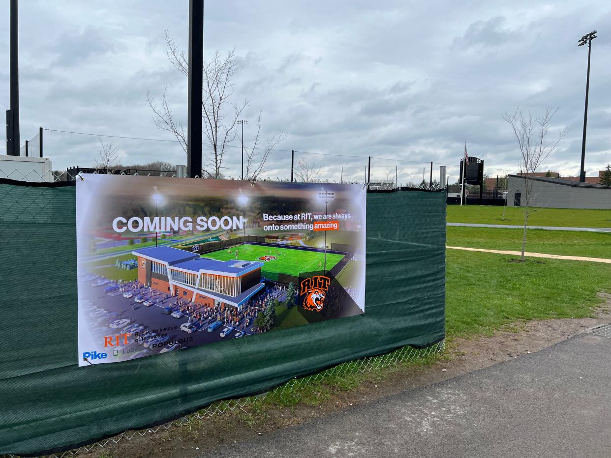 The barrier around the construction site of Rochester Institute of Technology's new Tiger Stadium on Thursday, April 18, 2024. The 38,828-square-foot stadium, which will house soccer and lacrosse, is going up on the west side of the field.