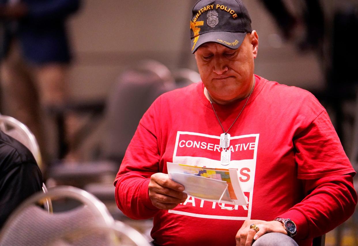 Warren City Councilman Eddie Kabacinski looks over maps as he listens to The Michigan Independent Citizens Redistricting Commission holds its first public hearing on Oct. 20, 2021 at the TCF Center in Detroit. Kabacinski lost in the 2023 primary in his bid to be elected to another term on the council.