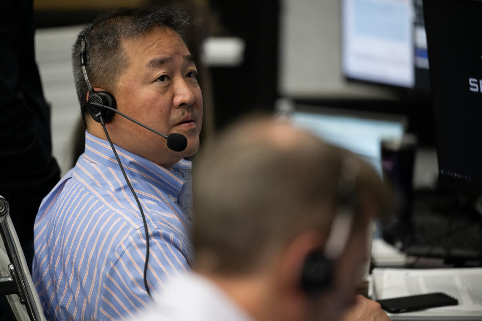 Ven Feng, deputy program manager for NASA's commercial crew program, monitors the countdown during a Crew-6 launch dress rehearsal Feb. 24, 2023 for a SpaceX Falcon 9 rocket and Crew Dragon spacecraft.