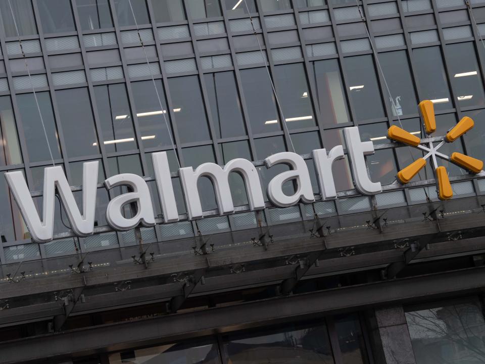 <p>The Walmart logo is seen on a store in Washington, DC, on 1 March 2019</p> ((AFP via Getty Images))