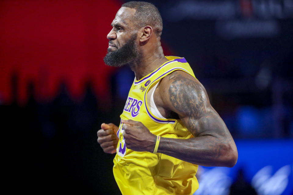 Los Angeles Lakers forward LeBron James (23) reacts after making a basket against the Indiana Pacers during the first half of the championship game in the NBA basketball In-Season Tournament on Saturday, Dec. 9, 2023, in Las Vegas. (AP Photo/Ian Maule)