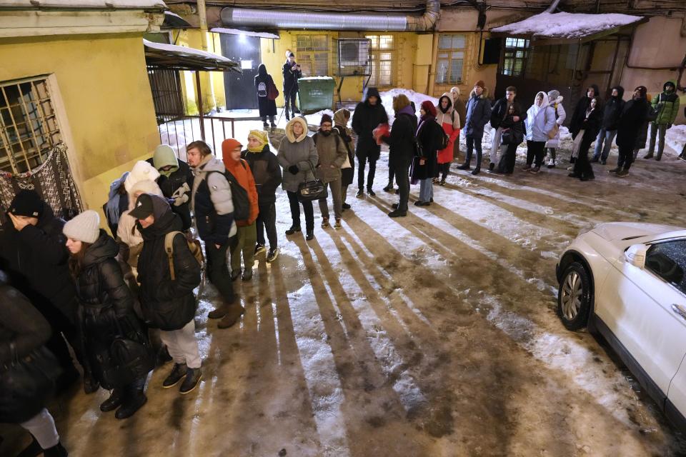 FILE - People line up in St. Petersburg, Russia, on Tuesday, Jan. 23, 2024, to sign petitions for the candidacy of Boris Nadezhdin, a liberal Russian politician who is seeking to run in the March 17 presidential election. Supporters lined up not just in progressive cities like Moscow and St. Petersburg but also in Krasnodar in the south, Saratov and Voronezh in the southwest and beyond the Ural Mountains in Yekaterinburg. There also were queues in the Far East city of Yakutsk, 450 kilometers (280 miles) south of the Arctic Circle, where Nadezhdin's team said up to 400 people a day braved temperatures that plunged to about minus 40 Celsius (minus 40 Fahrenheit) to sign petitions. (AP Photo/Dmitri Lovetsky, File)