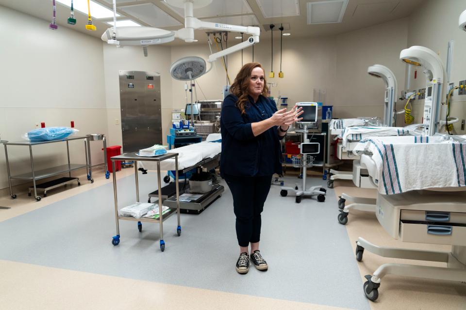 Kate Wales, director of perinatal services at St. David’s Women’s Center of Texas, stands in one of the new operating rooms at St. David's North Austin Medical Center on Friday. The Women’s Center now has four floors and 166,369 square feet. It is expected to help St. David’s deliver more than 10,000 babies in 2023.