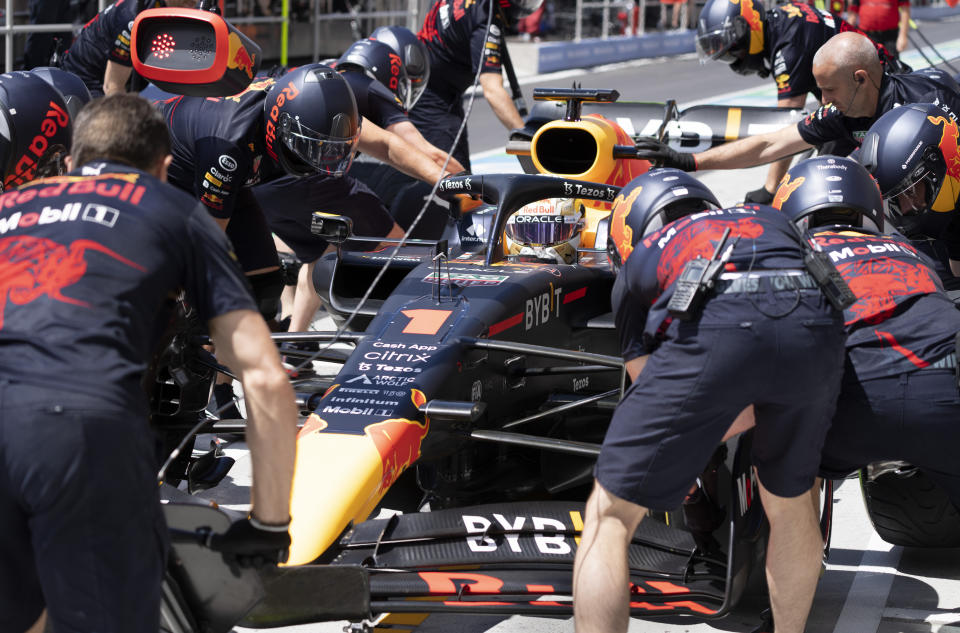 Red Bull Racing Max Verstappen, of the Netherlands, pulls into the pits during the first practice session at the Formula One Canadian Grand Prix auto race in Montreal, Friday, June 17, 2022. (Paul Chiasson/The Canadian Press via AP)