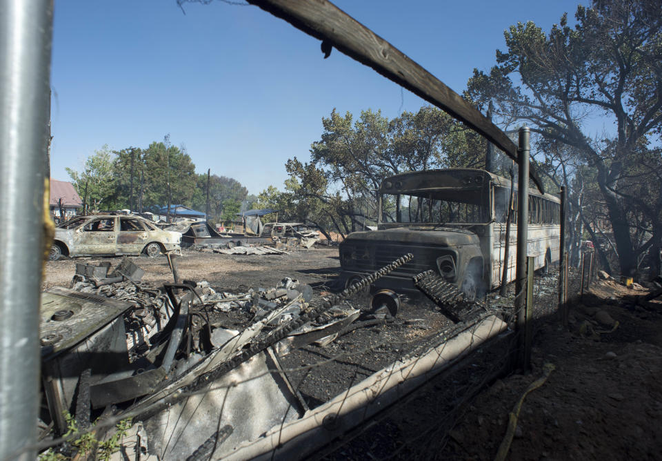 <p>Property destroyed by the fire in Moab, Utah, near Pack Creek, Wednesday, June 13, 2018. (Photo: Rick Egan/The Salt Lake Tribune via AP) </p>