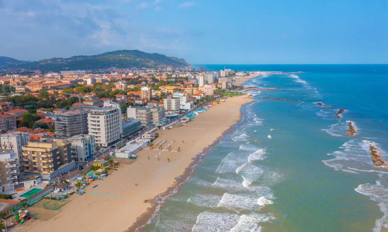 <span>Pesaro has several kilometres of fine sandy beach – and a Rossini festival in July.</span><span>Photograph: Pavel Dudek/Alamy</span>