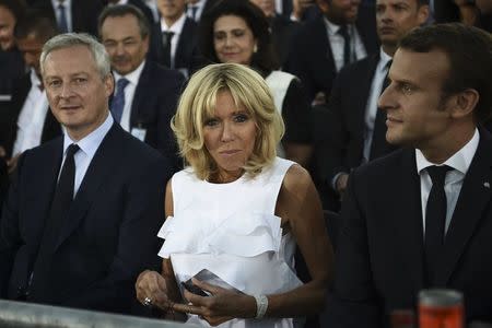 French President Emmanuel Macron and his wife Brigitte Macron attend an event on Pnyx hill in Athens, Greece, September 7, 2017. REUTERS/Aris Messinis/Pool