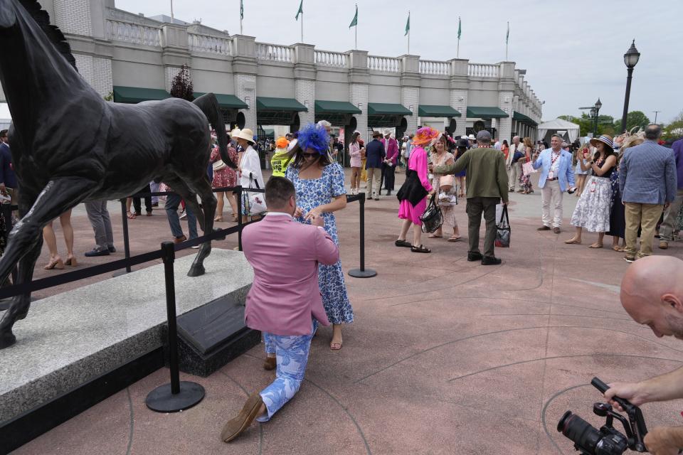 Brock Waynik got down on one knee to proposed to Olivia Turner at Churchill Downs on Saturday, May 5, 2023. The two are from Zebulon, North Carolina, and are at their first Kentucky Derby.