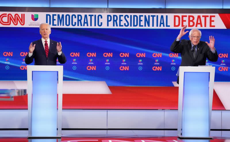 Democratic U.S. presidential candidates Senator Bernie Sanders and former Vice President Joe Biden at the 11th Democratic candidates debate of the 2020 U.S. presidential campaign in Washington