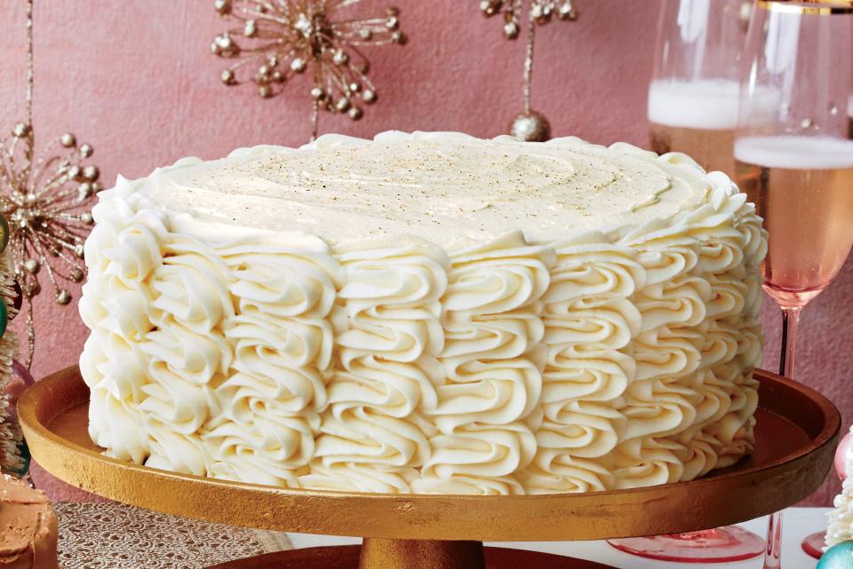 Eggnog Spice Cake with Bourbon Custard Filling and Eggnog Buttercream